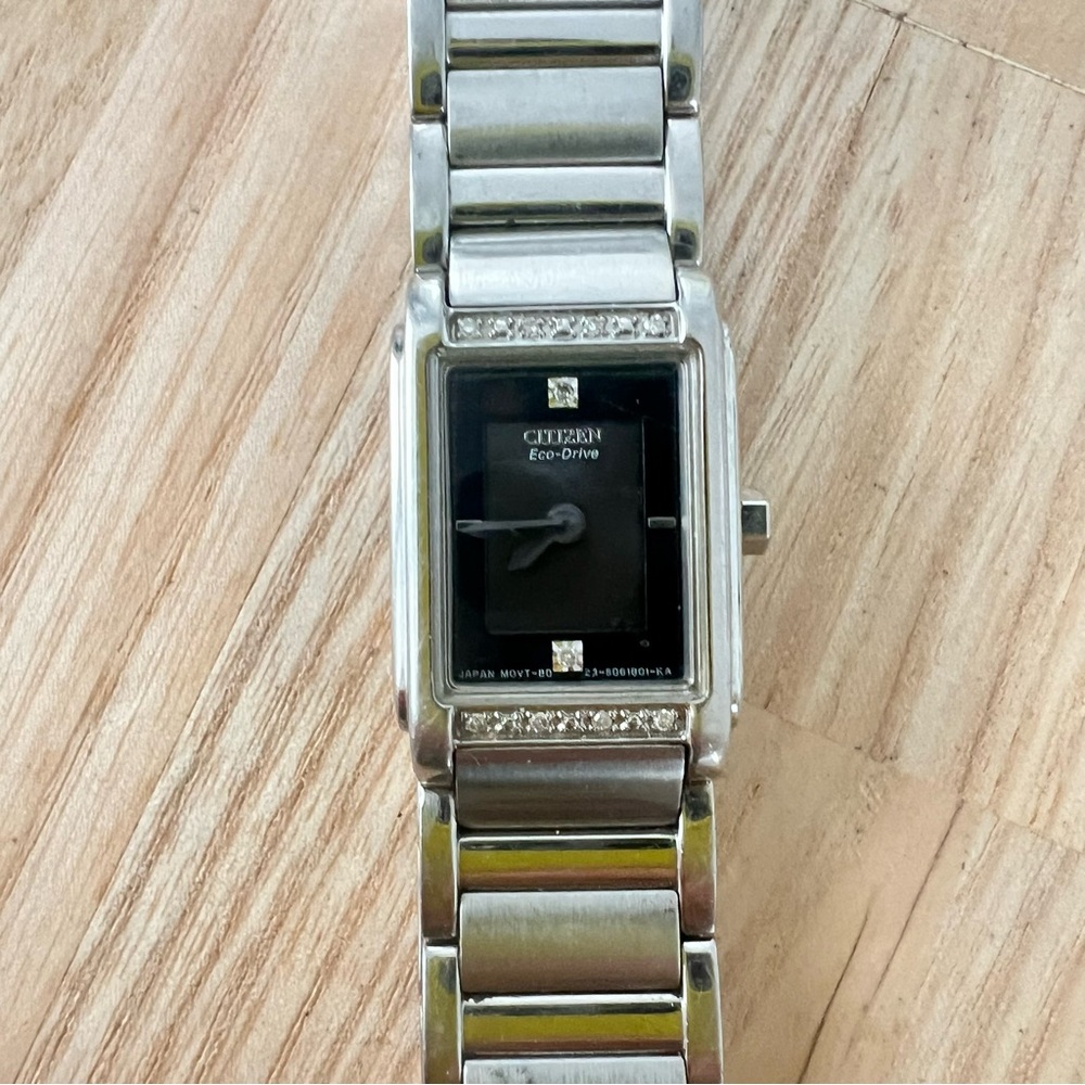 Citizen eco drive ladies black dial rectangular diamond dress watch